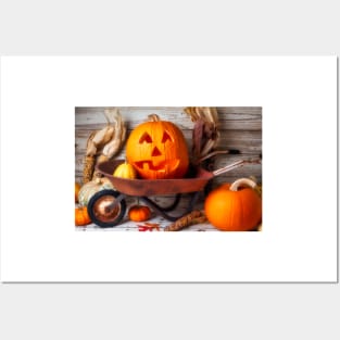 Carved Pumpkin In Old Wheelbarrow Posters and Art